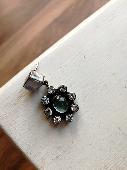 Chunky earring with 2 light blue/ grey stones and 8 clear crystal surrounding 