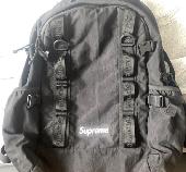 Lost a black Supreme back pack containing a MacBook and some clothes, alongside 
