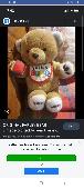 Farley bear ( name on bib) medium brown worn bear with white paws and brown stit