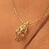 Lost golden teardrop necklace