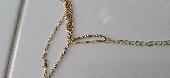 Found a golden necklace, on Warderobe Streed, London, area of St.Peter Cathedral