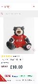His name is Jürgen and he's a dark grey teddy bear, with the Liverpool FC logo/s