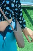 small dark purple handbag