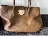 Hi my bag (photo attached) was stolen on 14th May 2023. It has my Prada sunglass