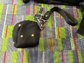 Hello, I found this key and attached purse on a tram in east Croydon. Thanks. 