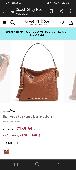 I lost my bag on bus stop..Bag is blue colour metro bank bag..inside my shoulder