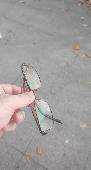 i Found glasses roday in Greewnich path There is a code on one of the temple arm