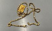 Lost a gold necklace with a rectangular Chinese pendant either in SW London (Bri