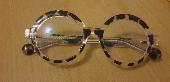 Found a pair of round tortoiseshell glasses on Lexington Street.