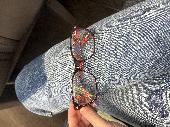 Hi there, I found a pair of Vivienne Westwood maroon and tartan glasses on the j
