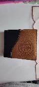 Black/Brown Levi Wallet with Bank cards, Driving License and a white card with a