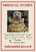 Pink with a yellow and white striped dress. Pink nose and black eyes.