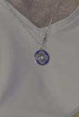 Lost a silver chain with a small blue and green pendant of an Irish harp. Lost s