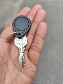 There is a white lady who was looking for her key while I was walking my dog in 