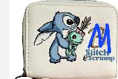 I've lost my white Stitch & Scrump purse, it has the letter 'M' on it. It contai