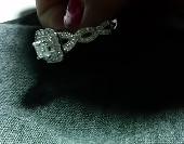 It is a diamond engagement ring with white gold i guess. 